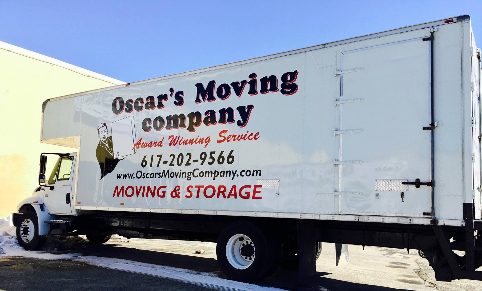 Oscar's Moving Company moving truck