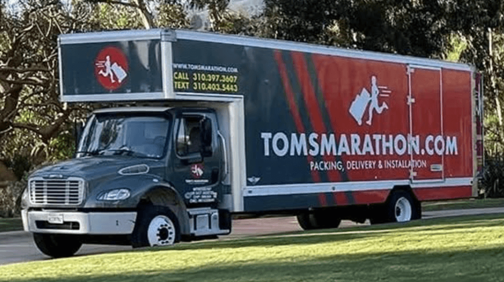 Tom's Marathon Movers moving truck